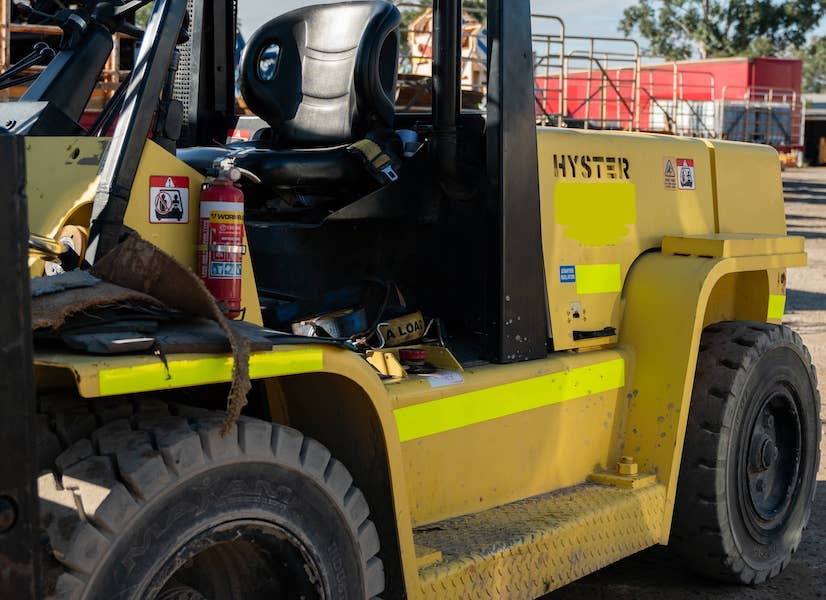 A heavy container fork lift