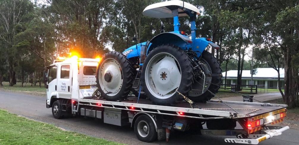 Tractor transport and towing through out Sydney.